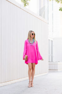 bright pink above the knee dress, bright pink bell sleeve dress, statement necklace under $100, jaime shrayber