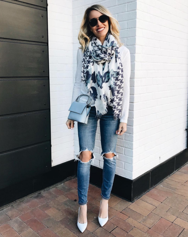 distressed denim - distressed jeans - jeans with holes - denim with holes - patterned scarf - scarf with pattern - white top for layering - white pumps - white heels - blue purse - mini handbag