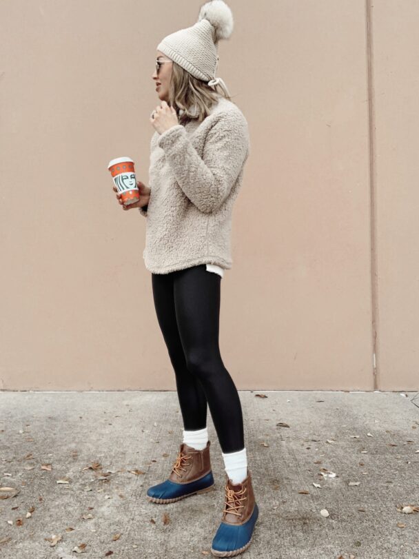 how to style faux black leather leggings with duck boots for winter