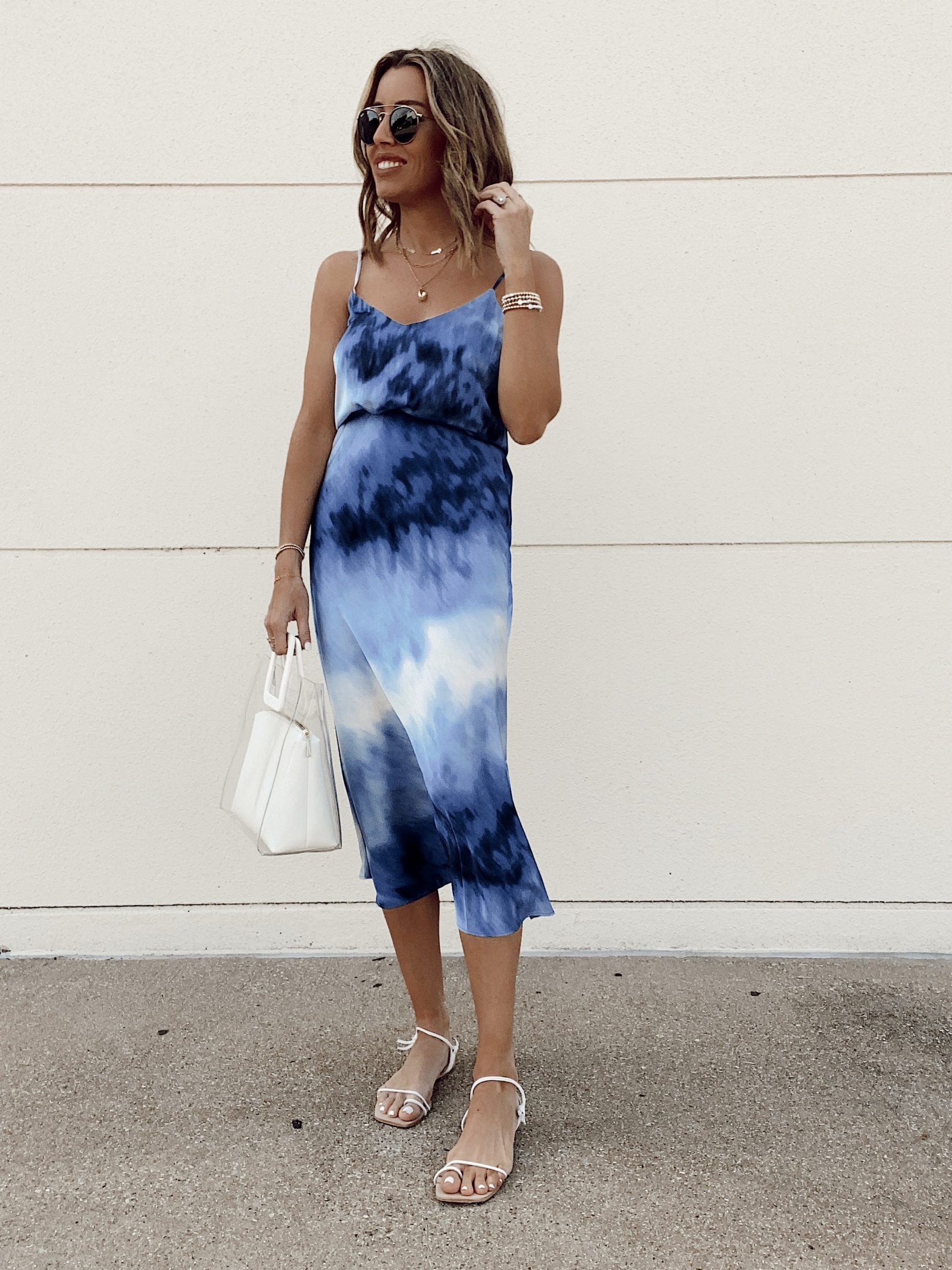 fashion blogger wearing tie dye matching 2 piece skirt set