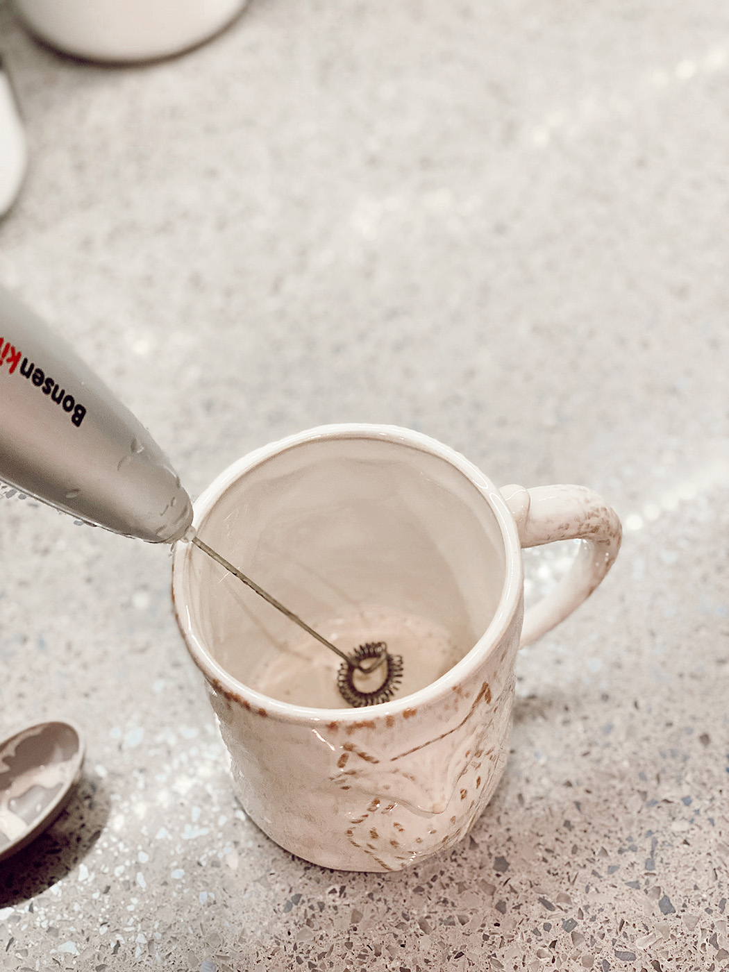 using a frother to make foamy coffee that doesn't separate from creamer