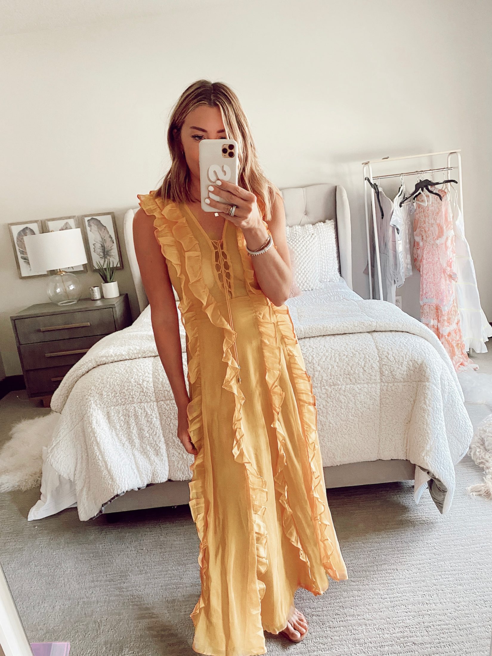 jaime shrayber wearing endless rose yellow ruffled detailed midi dress from amazon