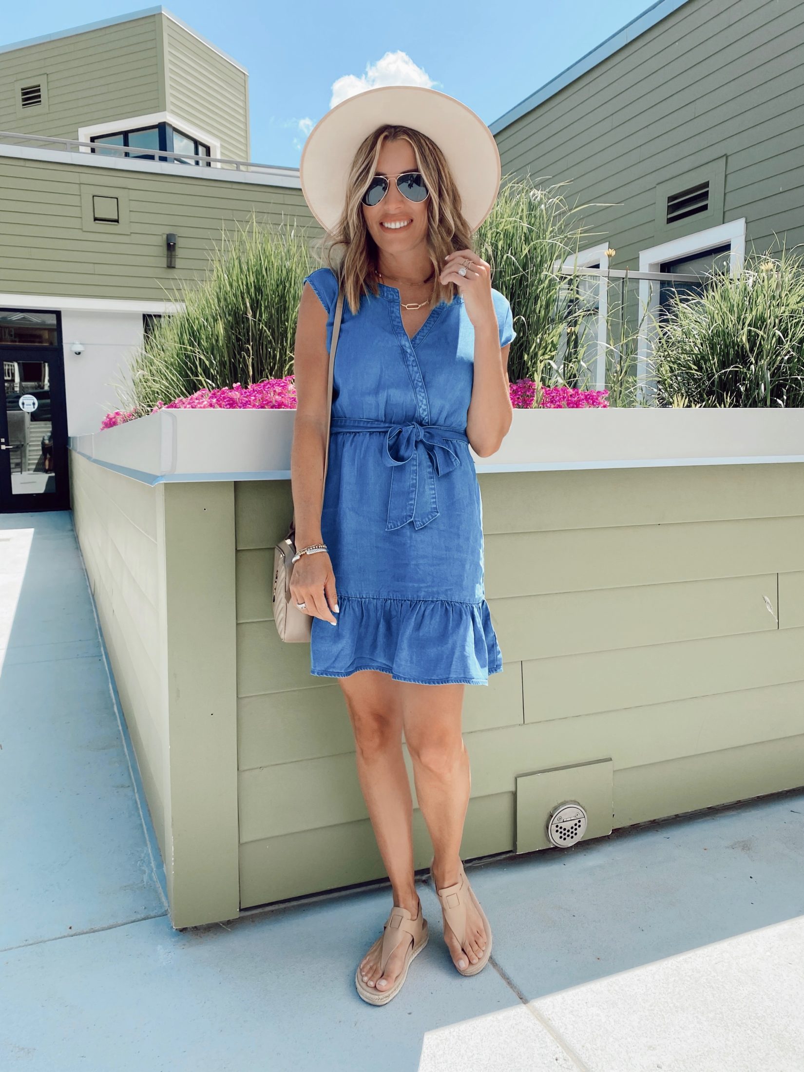 jaime shrayber wearing bb dakota chambray ruffle hem wrap mini dress with free people felt rancher hat