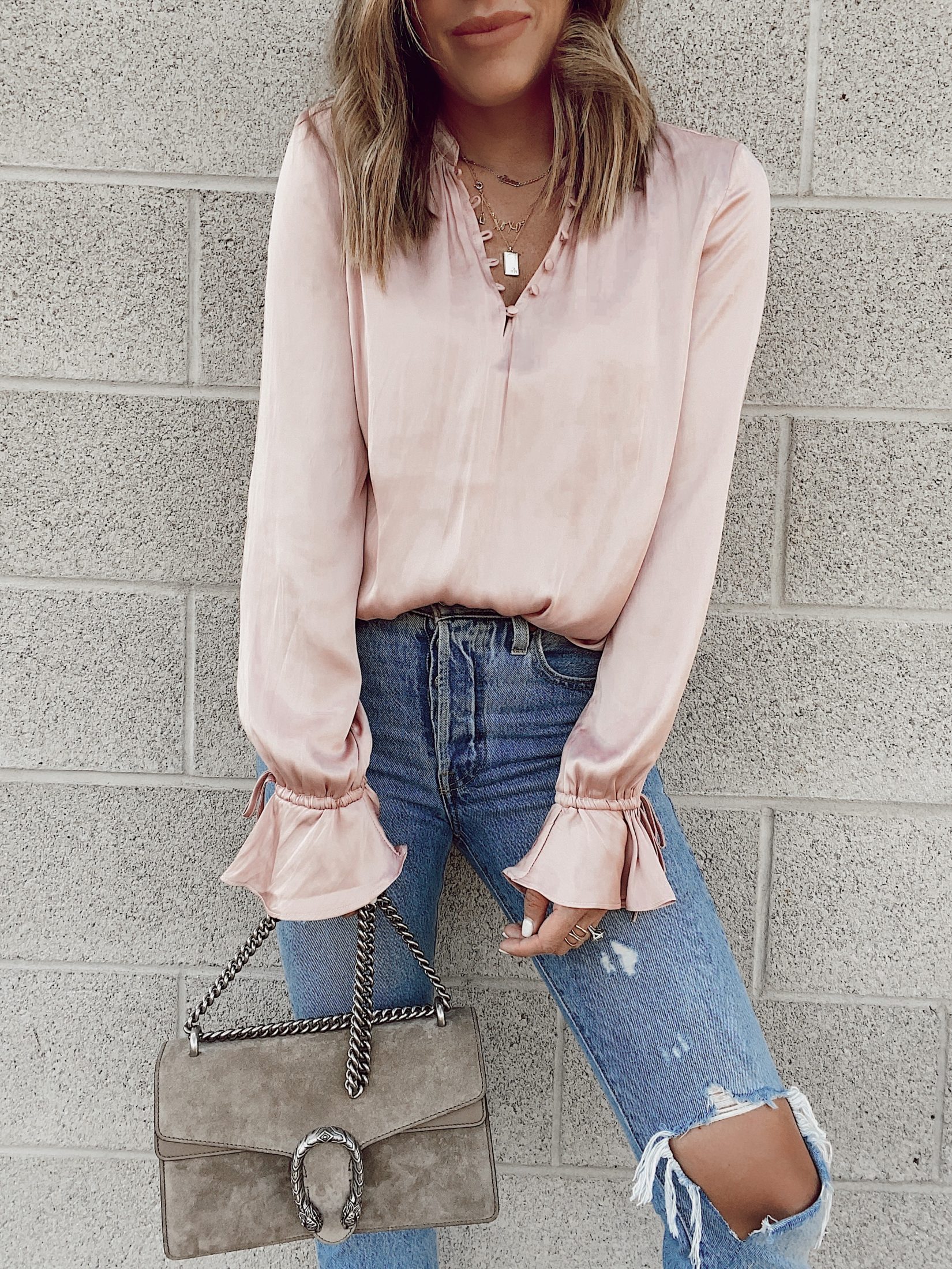 fashion blogger wearing paige pink ana ruffle sleeve blouse from nordstrom