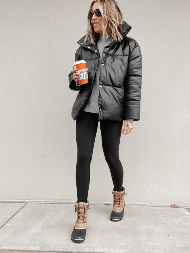 fashion blogger wearing oversized black faux leather puffer jacket