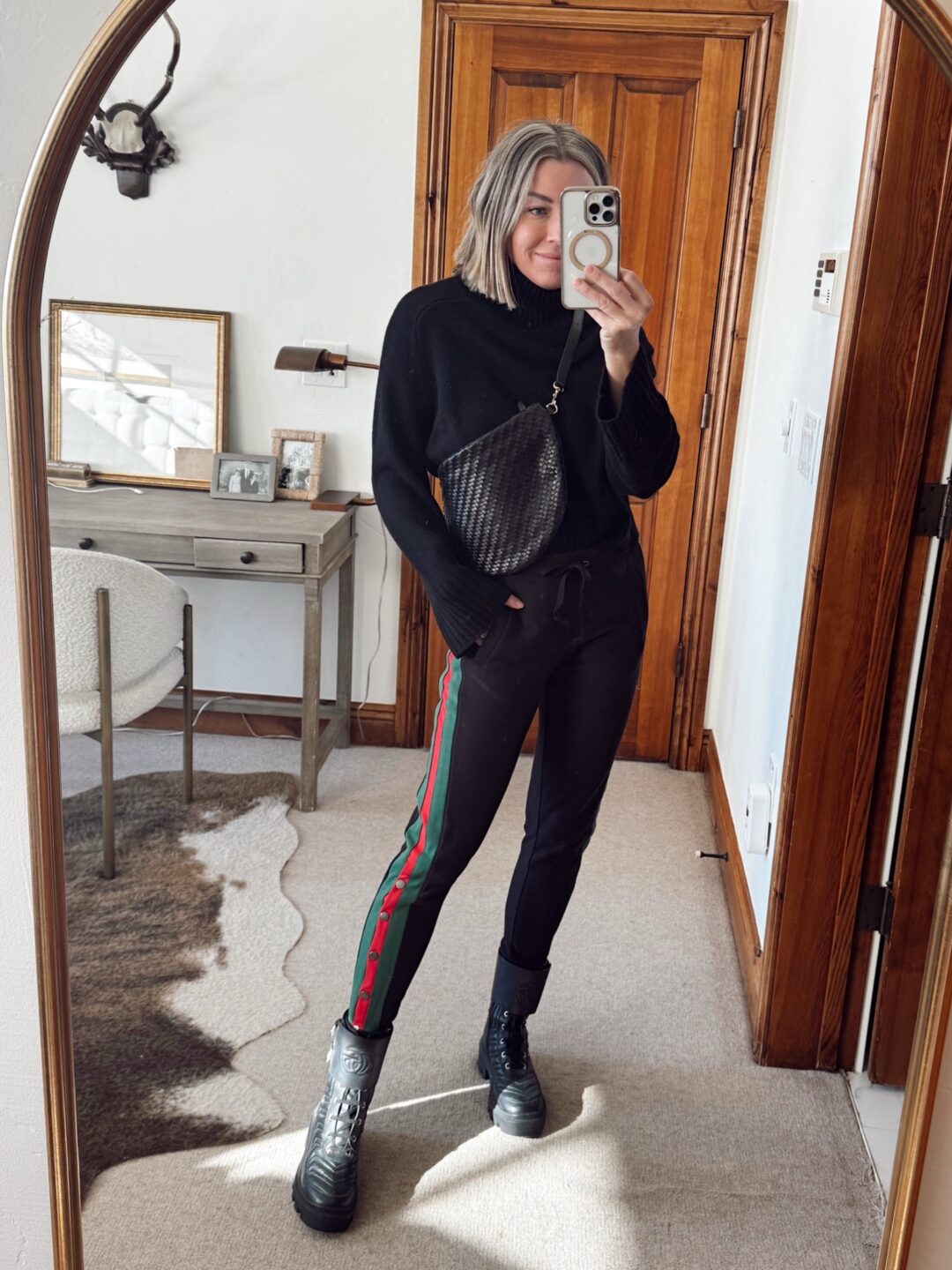 reformation black sweater with amazon leggings